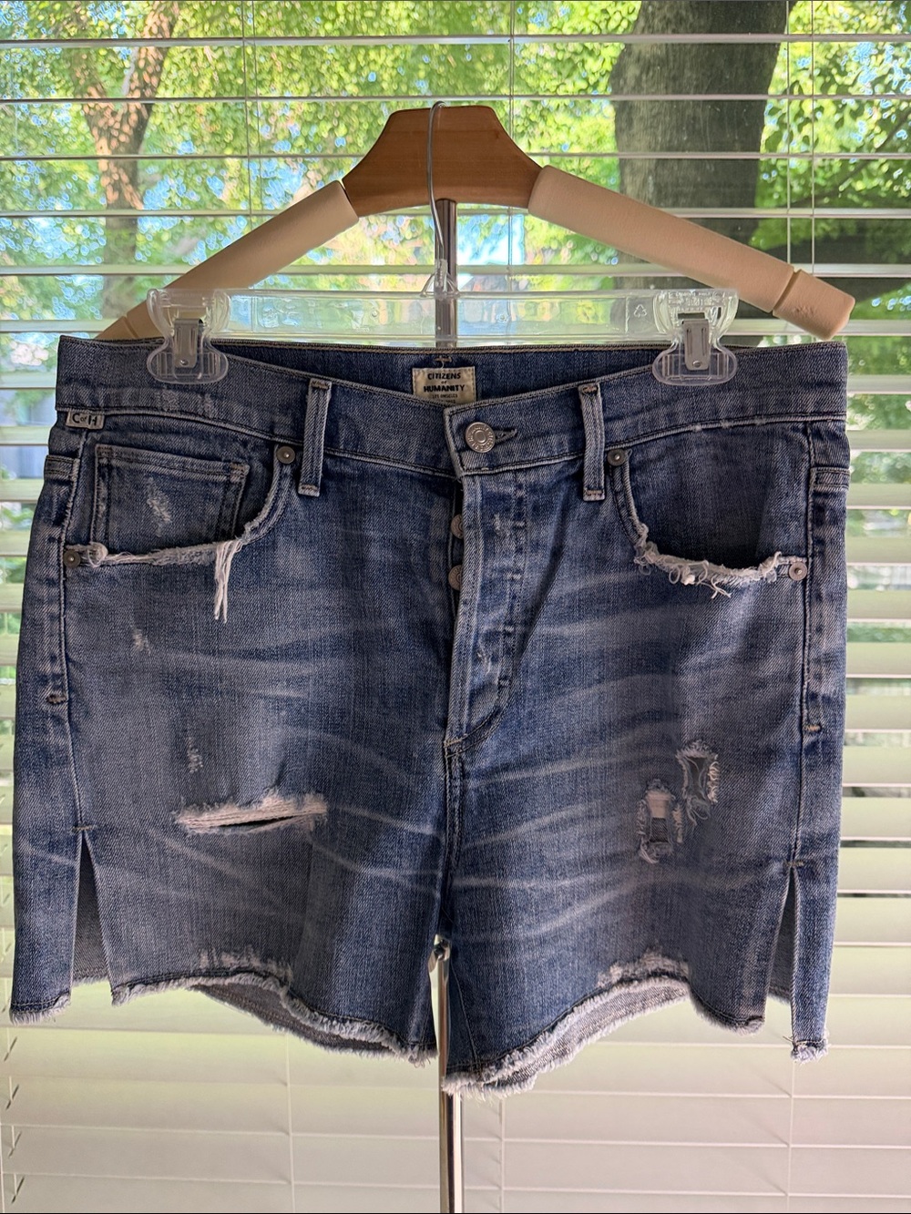Citizens Humanity Distressed Denim Shorts in Medium Blue Wash